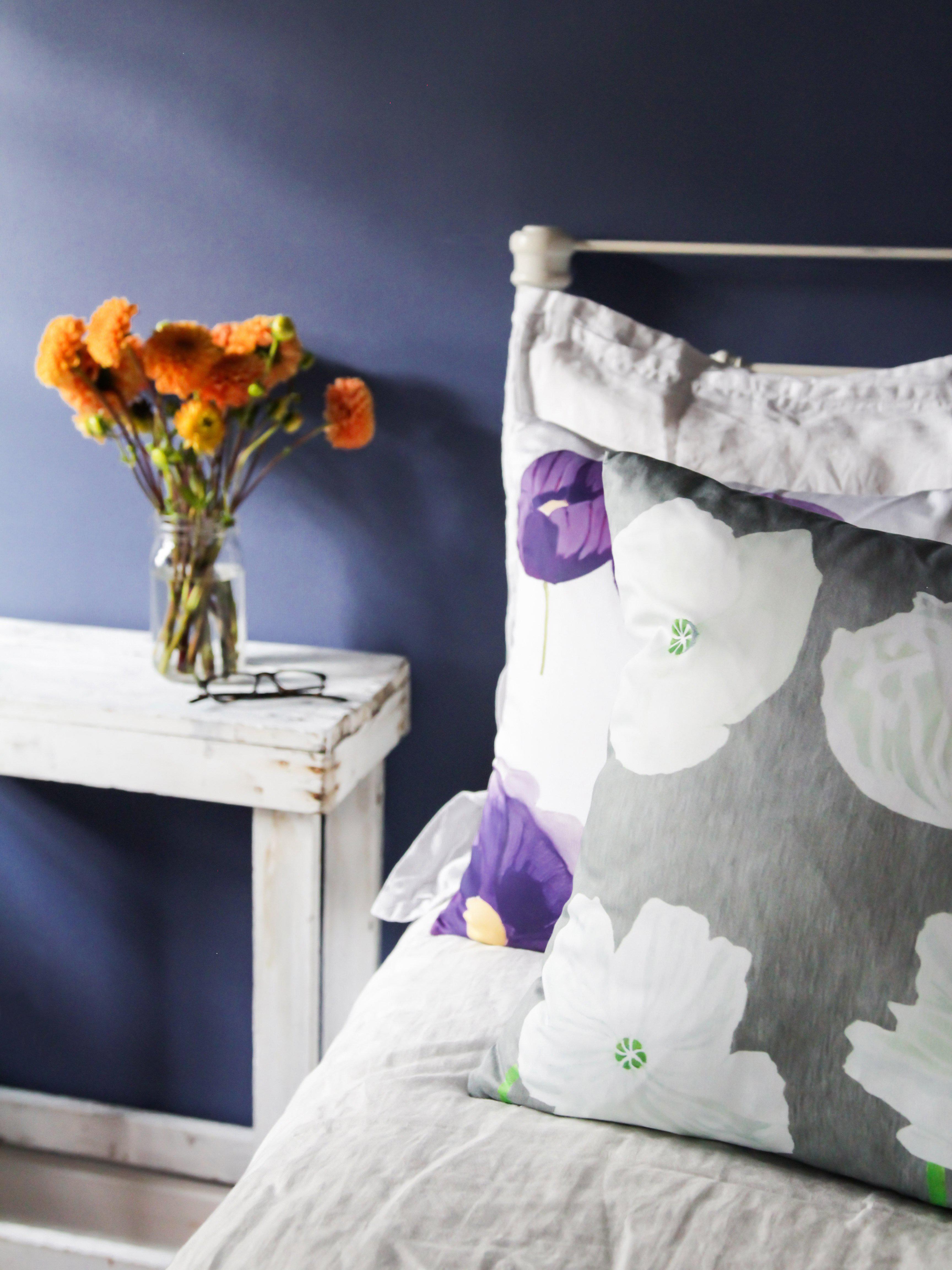 Throw Pillow: Purple Poppies on Snow-India & Purry